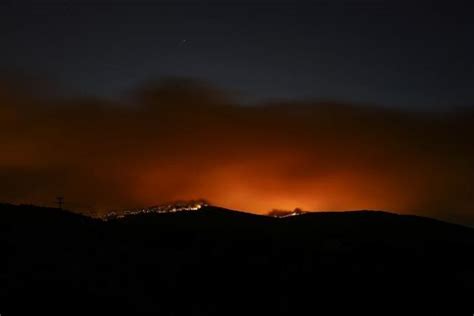 Wind-fanned wildfires force thousands to flee seaside resorts outside Greek capital